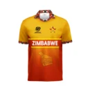 Zimbabwe national cricket team yellow and red T20 World Cup jersey front view with traditional pattern printed collar and Zimbabwe bird emblem